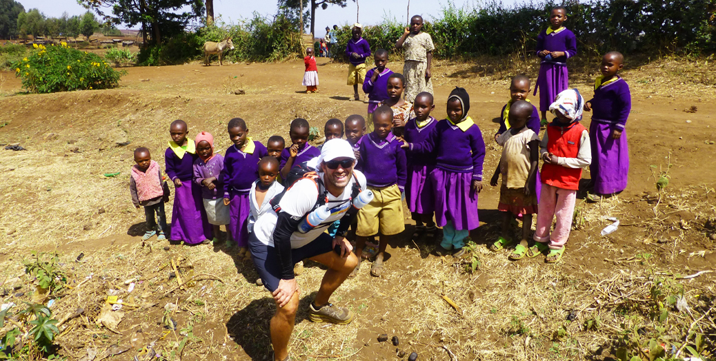 Brian Lasky with young students